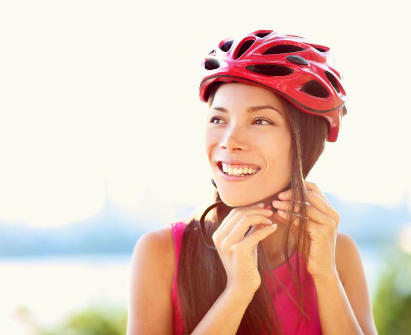 Woman Fastening Helmet - Avada Lifestyle Person Fastening Helmet